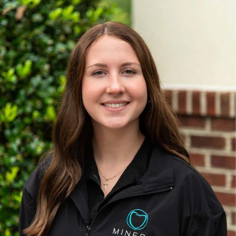 Julia smiling at minera orthodontics office